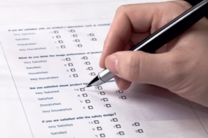 Close-up shot of a customer completing a satisfaction survey
