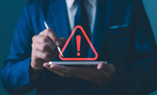 person holding a tablet with a pen and a red arrow hovering the tablet