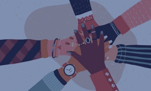 group of diverse hands together to show outcome of DEI survey questions