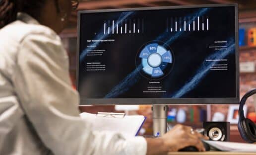 woman at a computer using CX management software to get deeper insights about the customer experience
